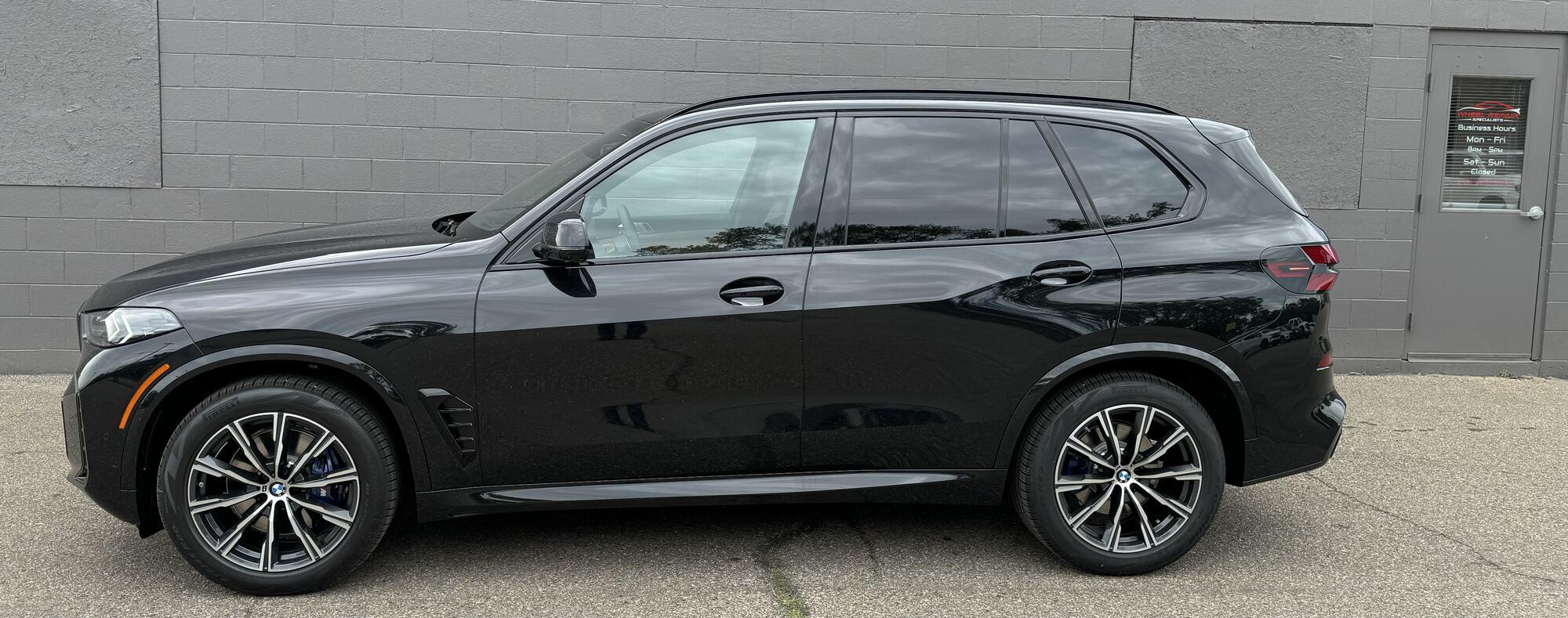 Black BMW X5 with machined-face wheels