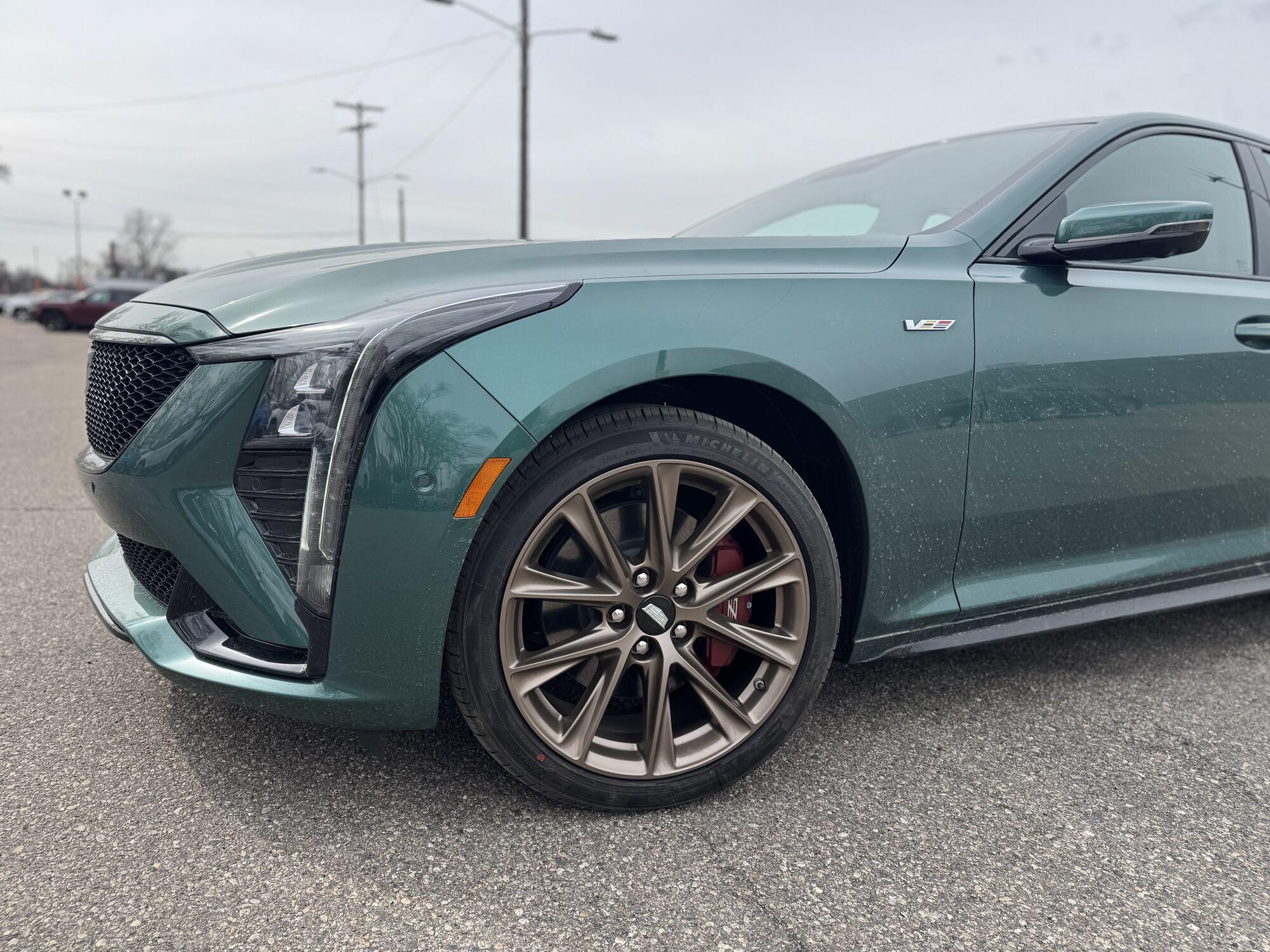 Green Cadillac CT5-V with bronze wheels