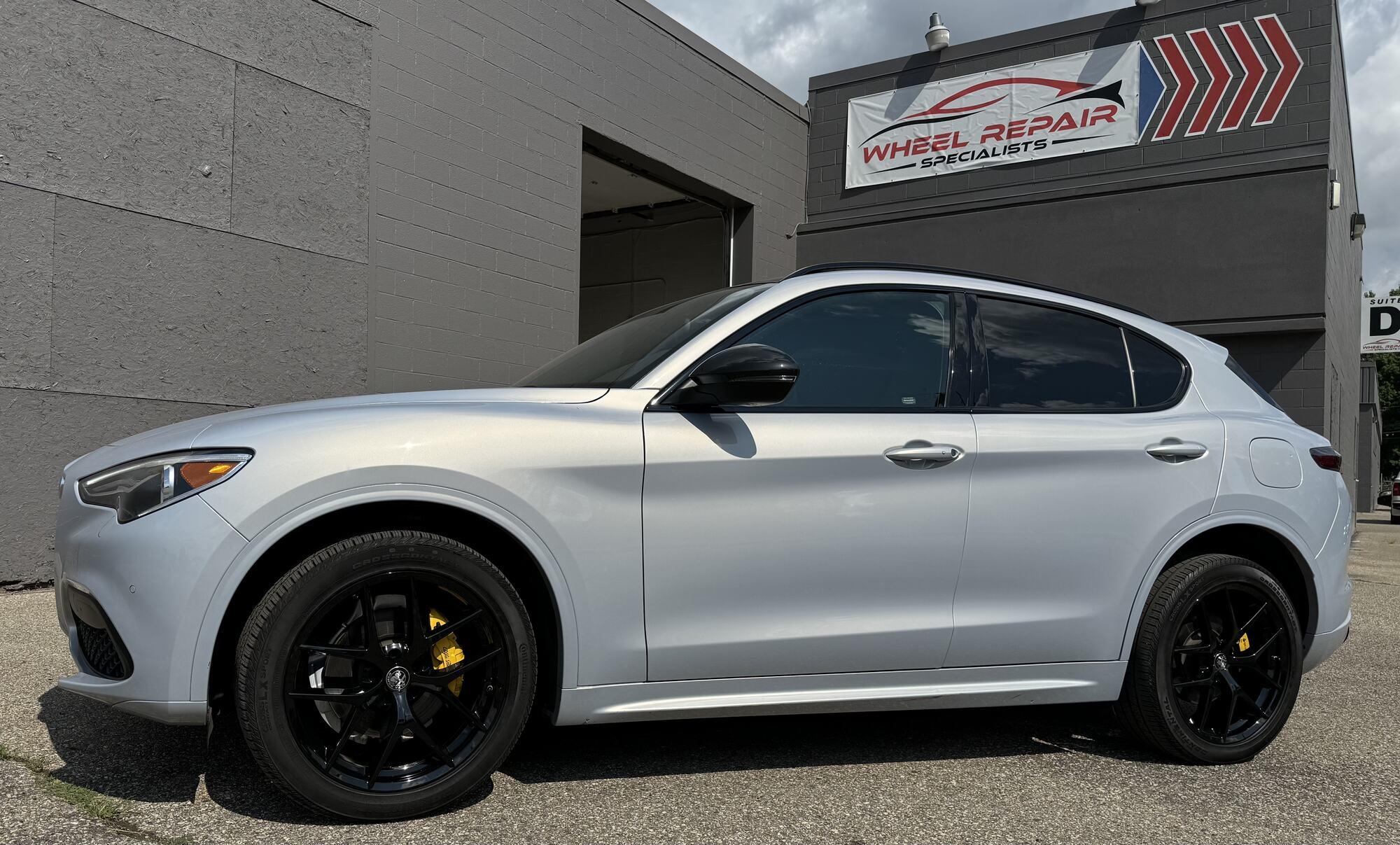 Silver Alfa Romeo Stelvio with black wheels