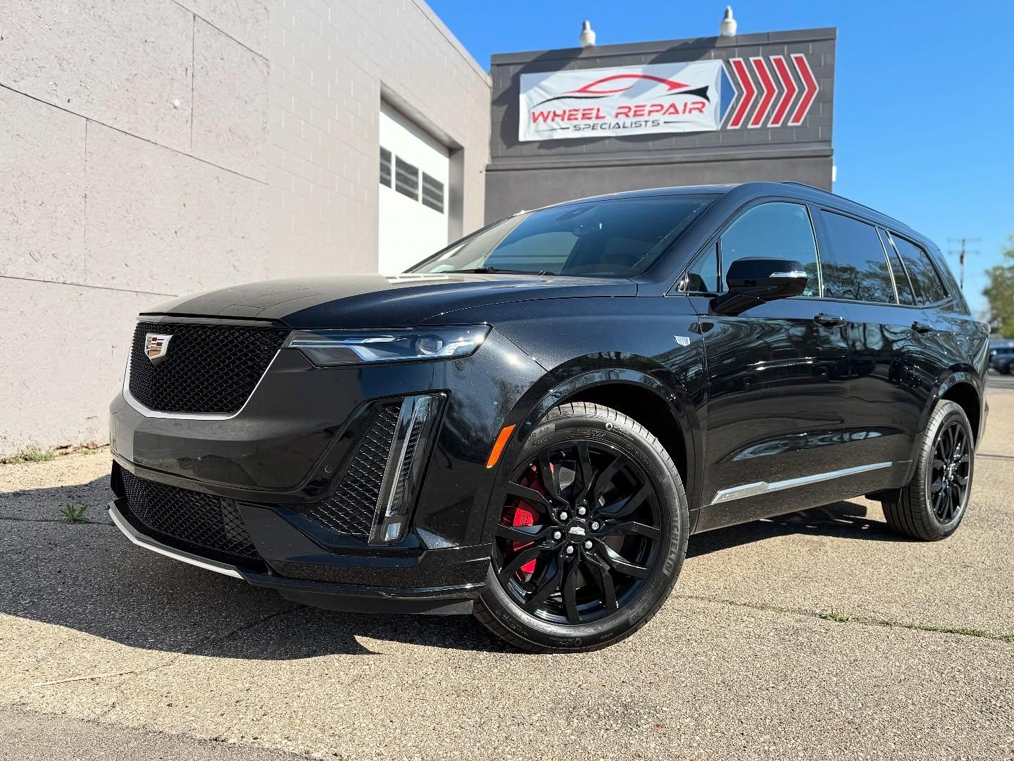 Cadillac XT6 outside the Ferndale shop