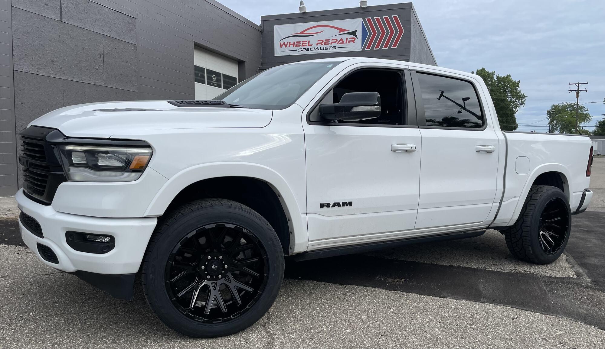 White Ram 1500 with black wheels
