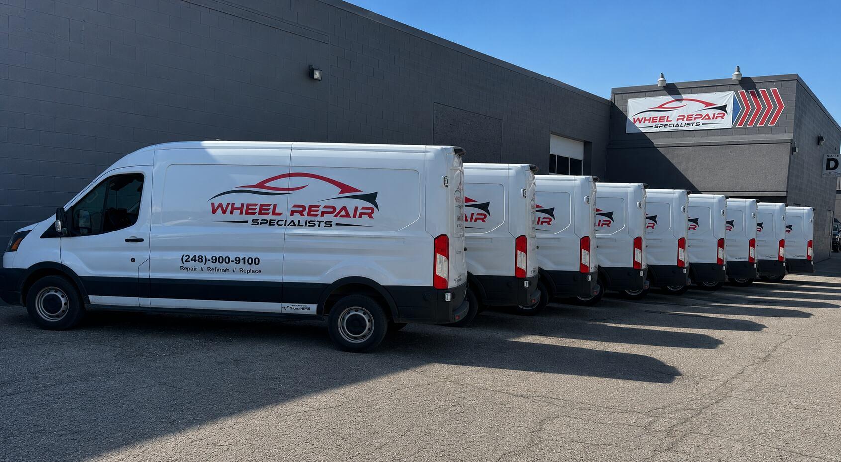Wheel Repair Specialists service vans lined up outside the Ferndale shop